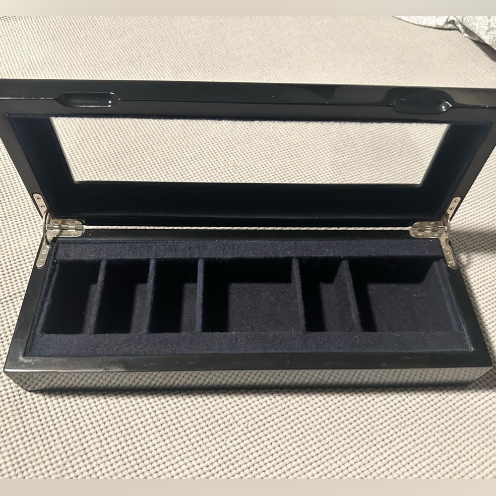 Black acrylic Ecclissi jewelry box with black felt lining